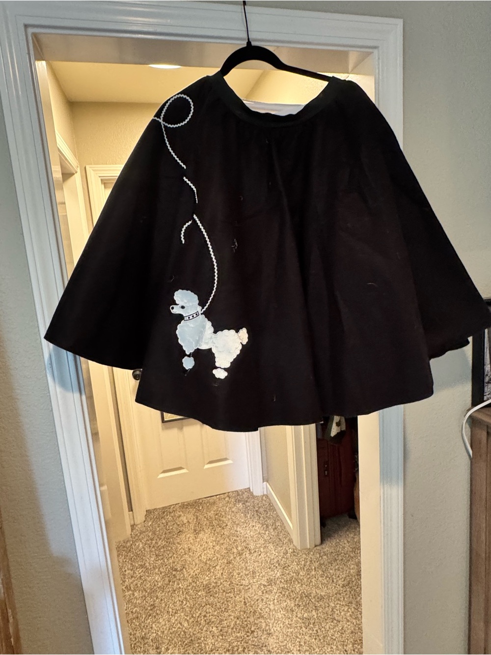 Black women’s Poodle Skirt with petticoat. Classic Retro Style
